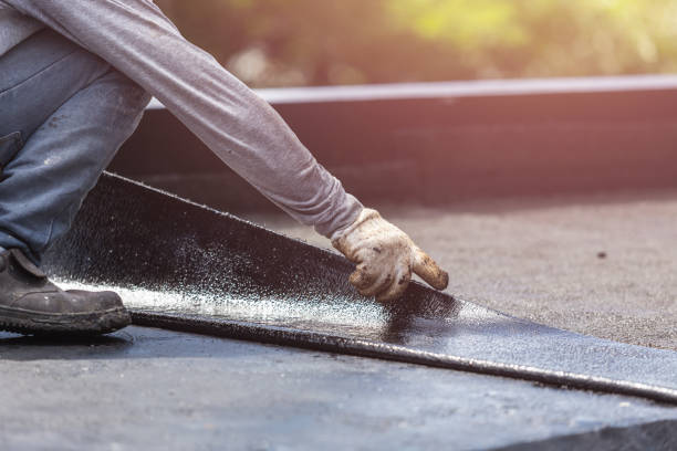 Professional Waterproofing technician working in Muskego, WI